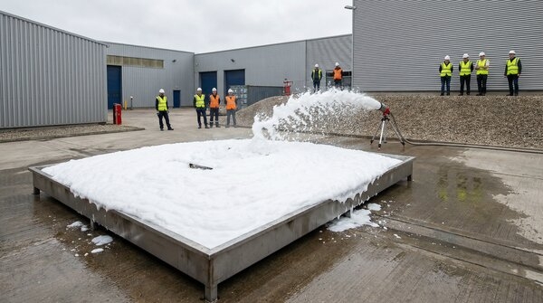 Firefighting foam blanket during suppression test on fuel fire tray
