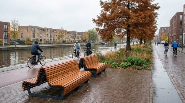 Linear park benches installed in urban public space